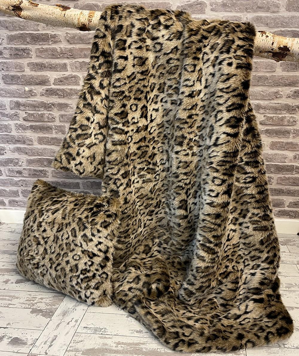 Leopard print fur blanket with leopard print cushion