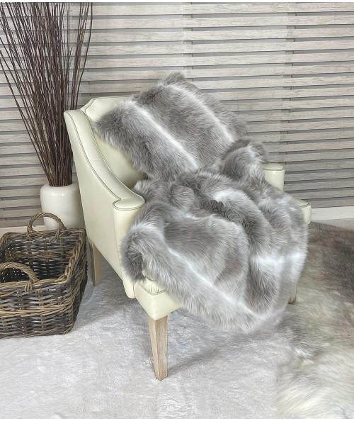 Reindeer throw and cushion in fake fur