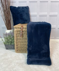 Bright blue fur blanket with fur cushion