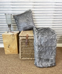 Luxury grey fur bedspread and fur cushion