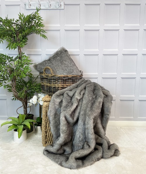 Luxury grey faux fur throw and cushion