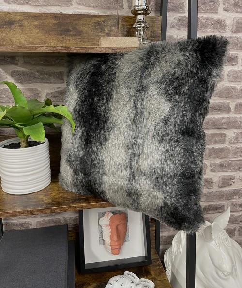 Striped faux fur cushion