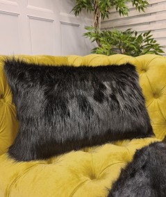 Rectangular sofa cushion with matching throw in black faux fur