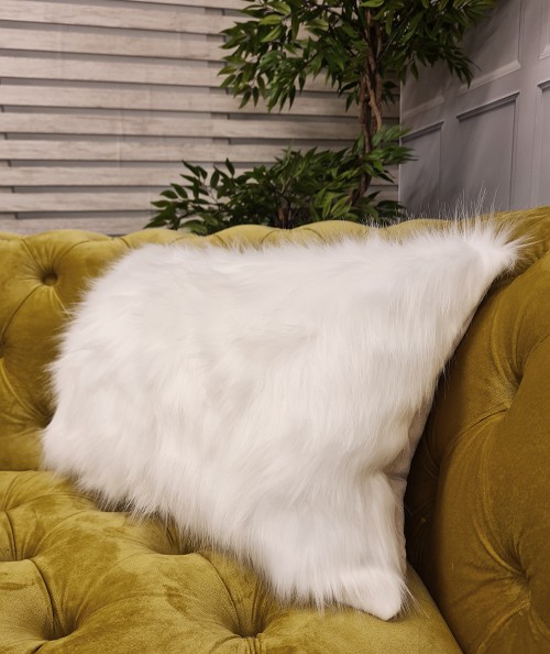 White fur rectangular bolster cushions