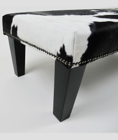 Black and white hair on hide footrest 308