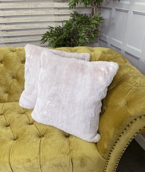 Luxury square cushions in cream and beige fur