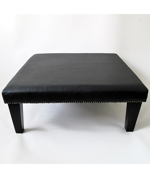 Plain black grained leather footstool 114 with modern tapered black leg